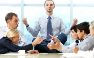 man meditating at work